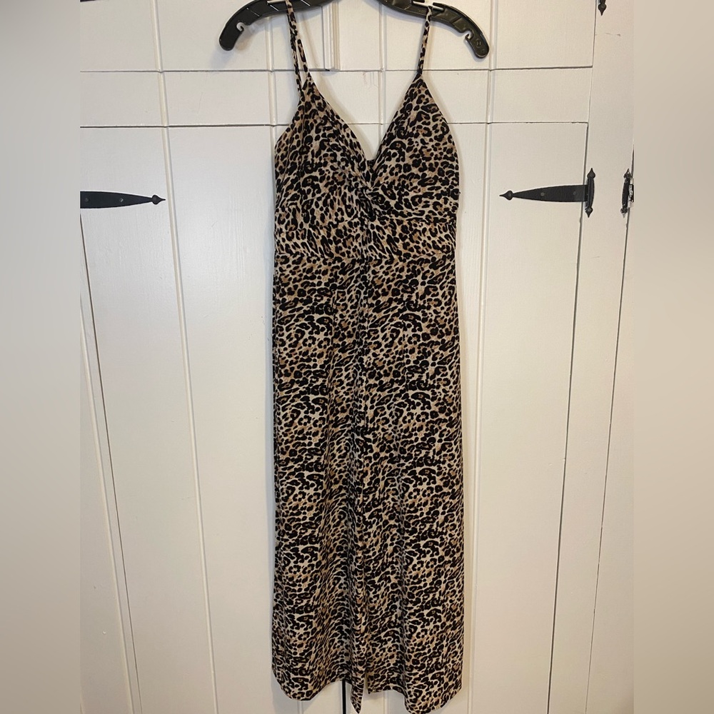 Crystal Sky Strappy Leopard Print Jumpsuit. Color: Black/Brown. Size: 5 Junior